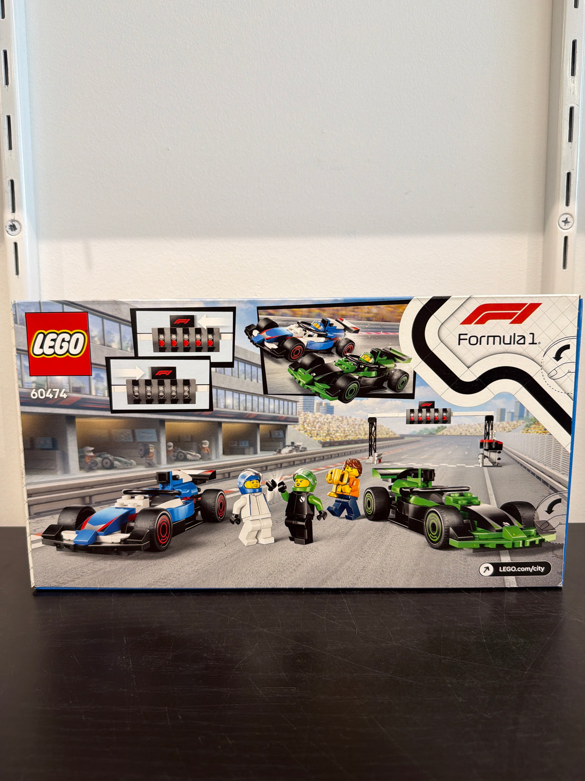 F1 Grid with VCARB & Sauber Race Cars